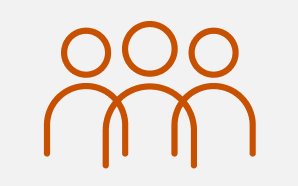 Orange silhouette icon of three people symbolizing community
