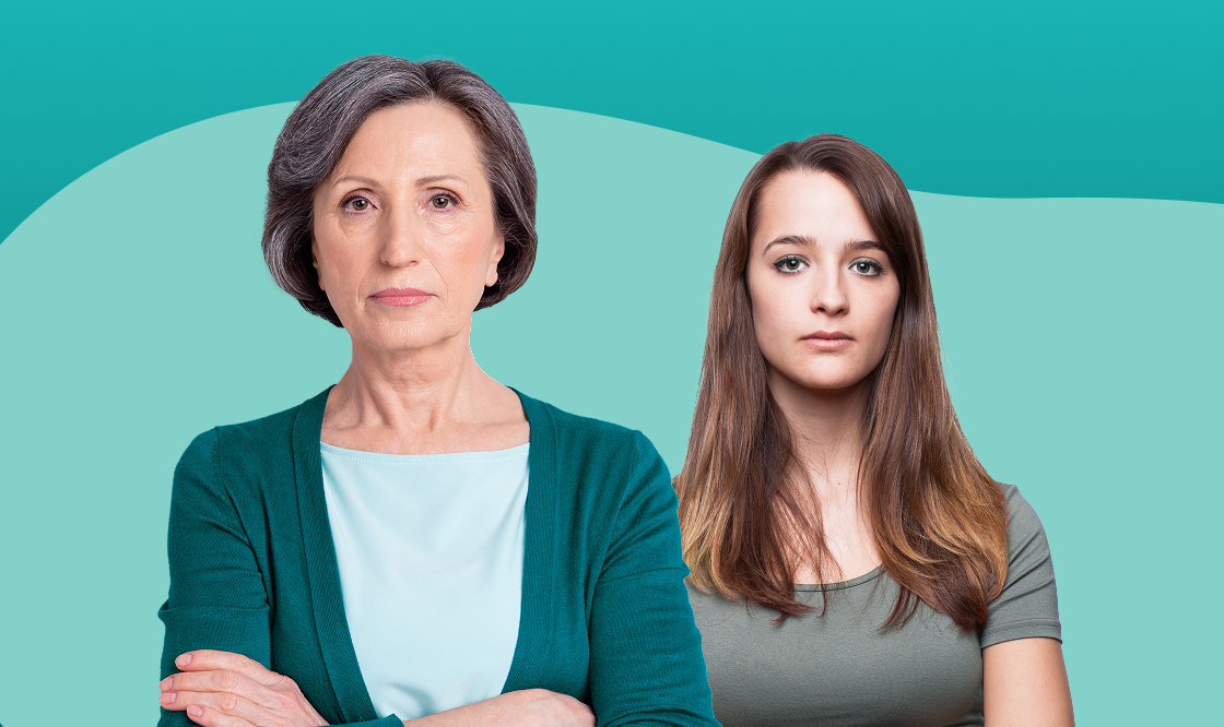Older woman and younger woman standing side by side with arms crossed